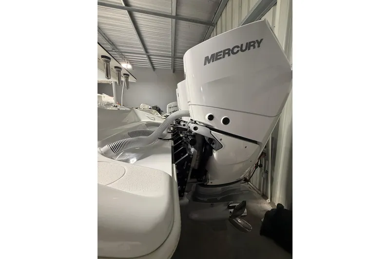 Slide: The Image of 2021 Yellowfin 36 Offshore boat with Mercury outboard engine in storage. - 23