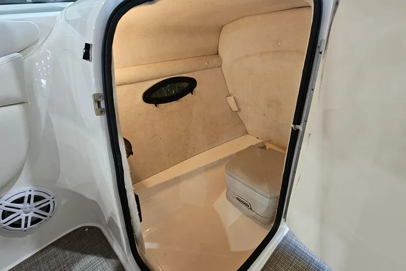 Slide: The Image of Interior cabin of 2000 Chaparral 230 SSi boat with storage compartment. - 13