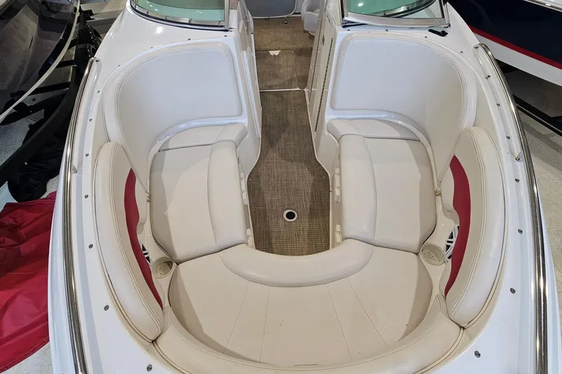 Slide: The Image of Interior view of a 2000 Chaparral 230 SSi boat with white seating. - 15