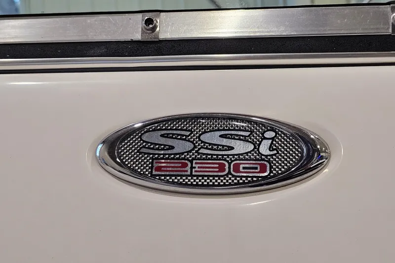 Slide: The Image of 2000 Chaparral 230 SSi emblem on a white surface, showcasing model branding. - 24