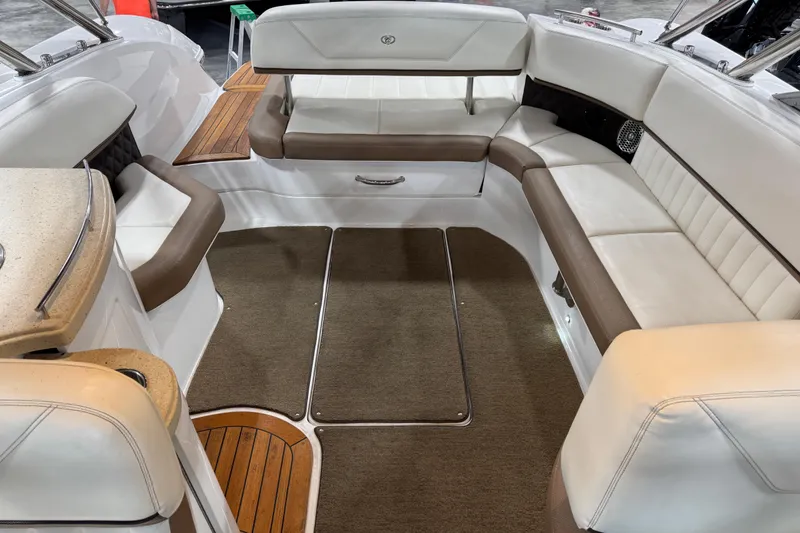 Slide: The Image of Luxurious interior of a 2015 Cobalt 302 boat with plush seating and elegant design. - 11