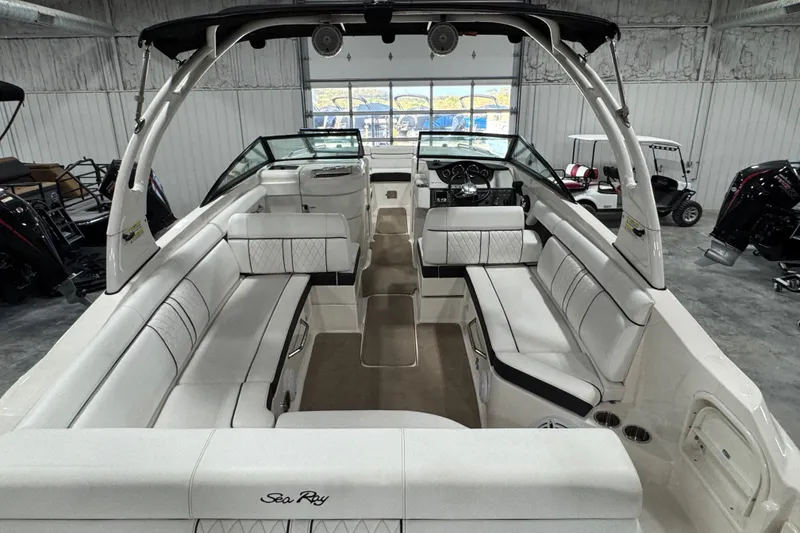 Slide: The Image of Interior view of a 2015 Sea Ray SDX 270 boat with spacious seating. - 13