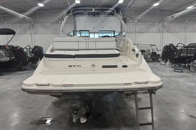 Slide: The Image of 2015 Sea Ray SDX 270 boat in a showroom, rear view with swim platform. - 5