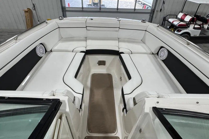Slide: The Image of Interior view of a 2015 Sea Ray SDX 270 boat with spacious seating. - 9
