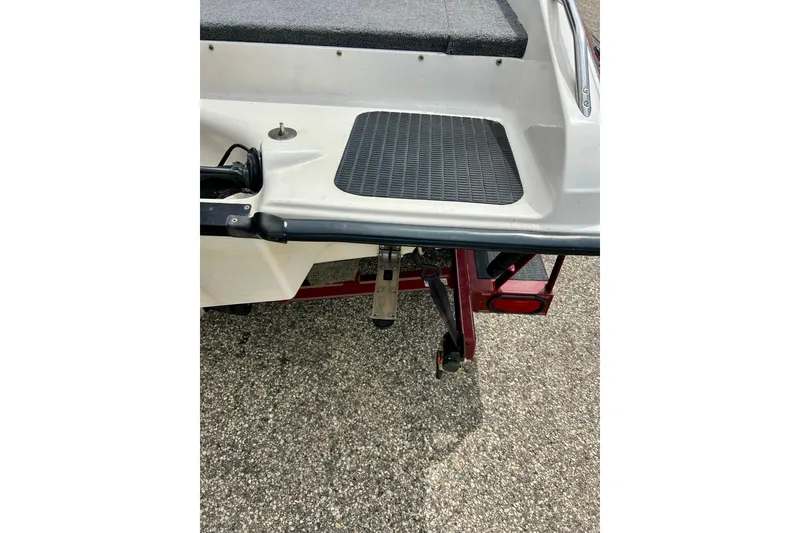 Slide: The Image of 1994 Stratos 290 Ski-N-Fish boat rear view with trailer attachment. - 15