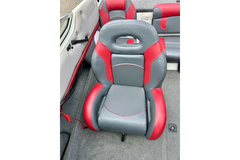 Slide: The Image of Red and gray seat in 1994 Stratos 290 Ski-N-Fish boat interior. - 28