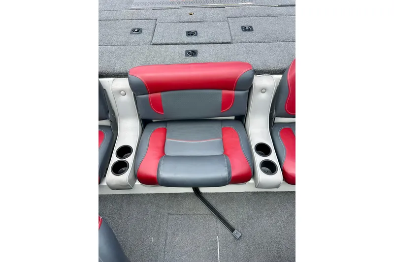 Slide: The Image of Red and gray seating on 1994 Stratos 290 Ski-N-Fish boat with cup holders. - 29