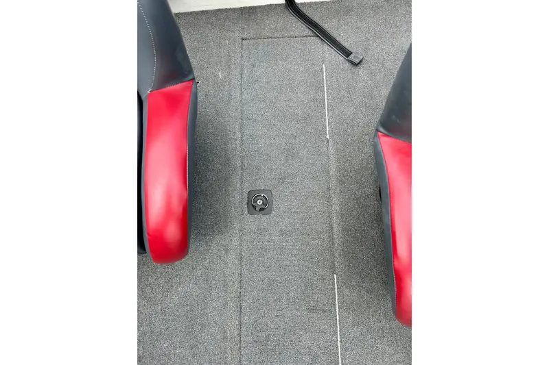 Slide: The Image of 1994 Stratos 290 Ski-N-Fish boat interior with red and black seats. - 41