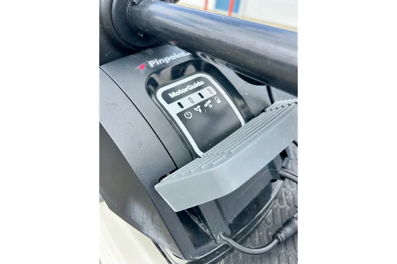 Slide: The Image of Close-up of MotorGuide control panel on 1994 Stratos 290 Ski-N-Fish boat. - 60