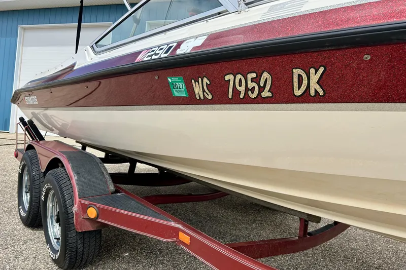 Slide: The Image of 1994 Stratos 290 Ski-N-Fish boat on trailer, registration WS 7952 DK. - 8