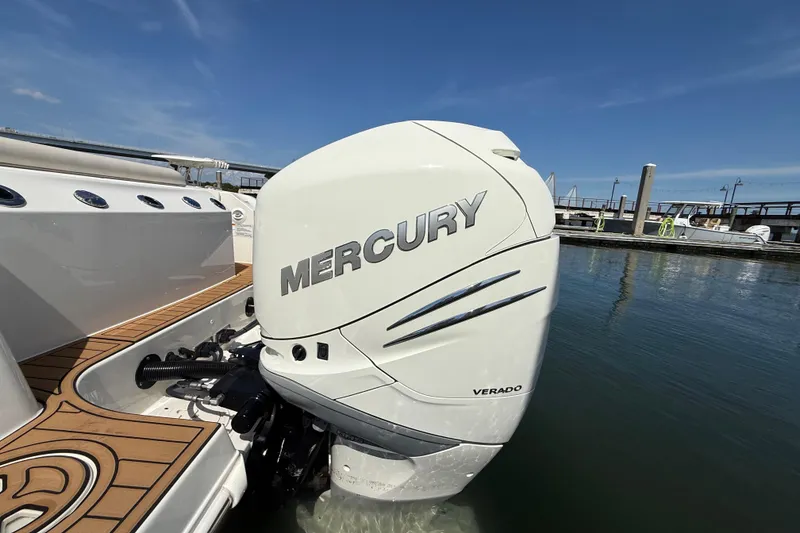 Slide: The Image of 2023 Boston Whaler 280 Outrage with Mercury Verado engine at dock. - 8