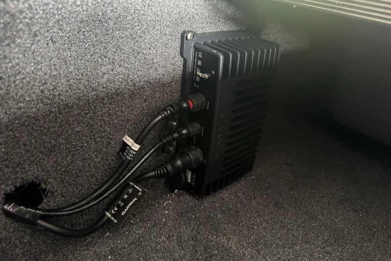 Slide: The Image of 2021 Ranger RT178 boat with Garmin electronic device installed in carpeted compartment. - 27