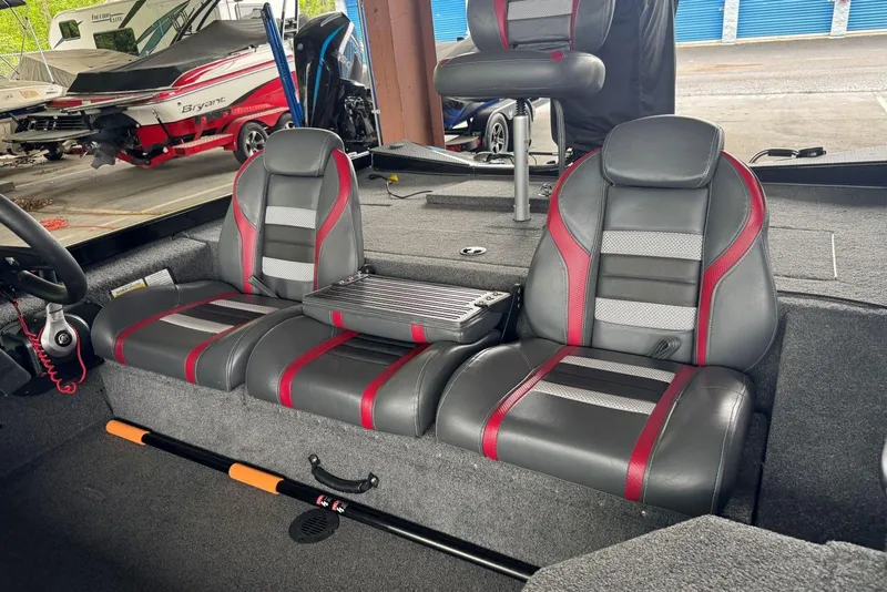 Slide: The Image of 2021 Ranger RT178 boat interior with gray and red seating, showcasing modern design. - 29
