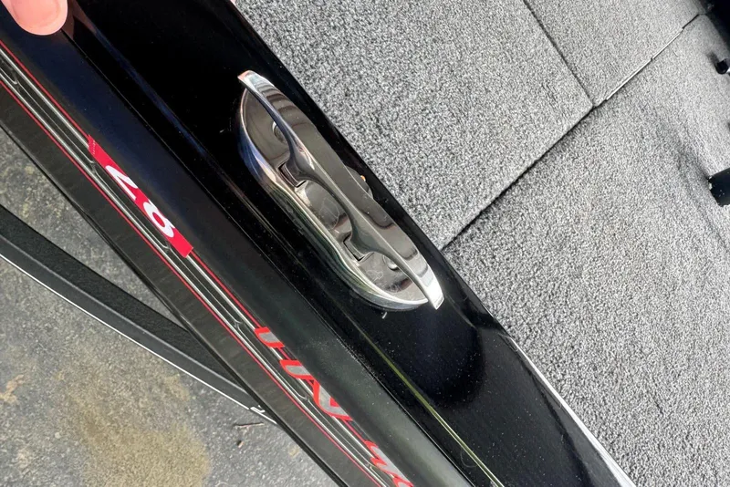 Slide: The Image of 2021 Ranger RT178 boat cleat on carpeted deck, showcasing sleek design and functionality. - 43