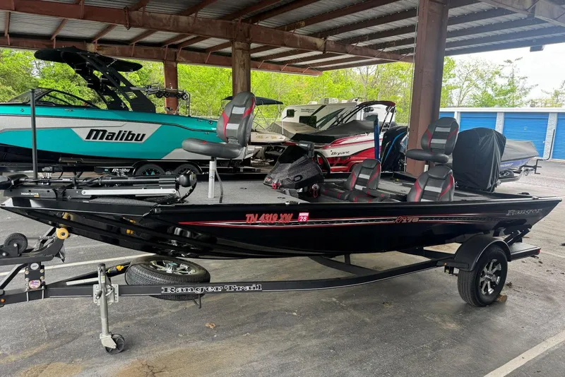 Slide: The Image of 2021 Ranger RT178 boat on trailer in covered storage area. - 7