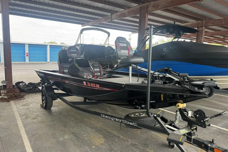Slide: The Image of 2021 Ranger RT178 boat on trailer in covered storage area. - 8