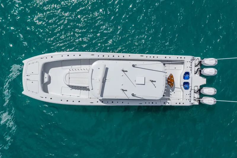 Slide: The Image of Aerial view of 2025 Freeman 43 boat on turquoise water. - 20