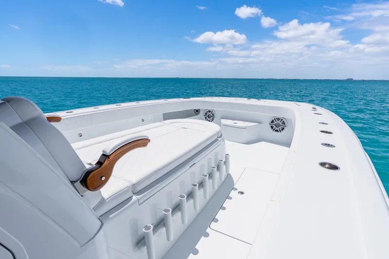 Slide: The Image of Luxurious 2025 Freeman 43 boat deck with ocean view under clear blue sky. - 44