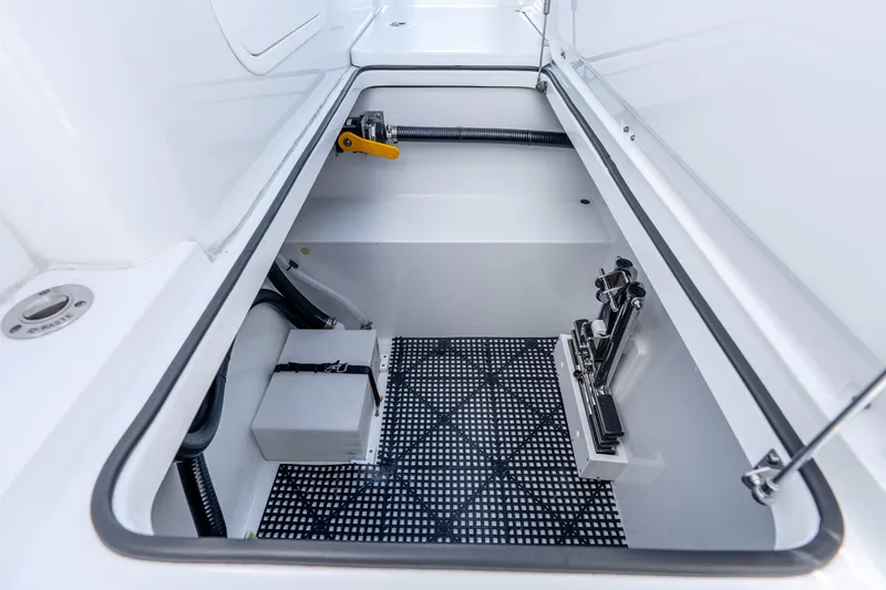 Slide: The Image of Storage compartment of 2025 Freeman 43 boat, featuring organized interior and secure fittings. - 59