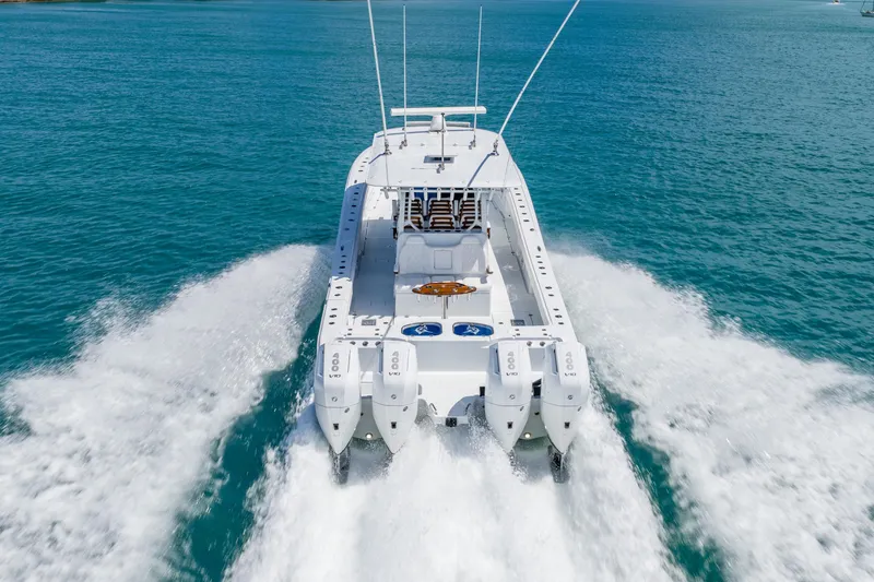 Slide: The Image of 2025 Freeman 43 boat cruising on clear blue ocean waters. - 6