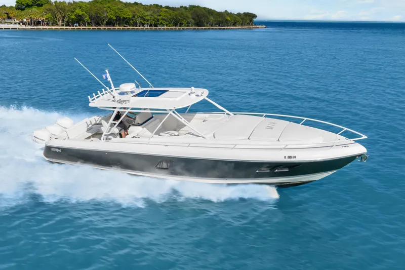 The Image of 2013 Intrepid 400 Cuddy cruising on blue ocean waters. - 0