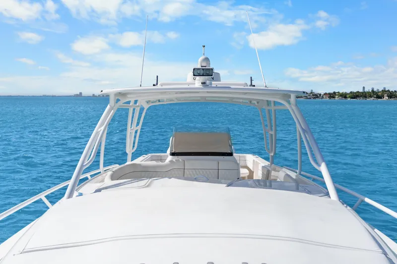 Slide: The Image of 2013 Intrepid 400 Cuddy cruising on clear blue waters under a sunny sky. - 30