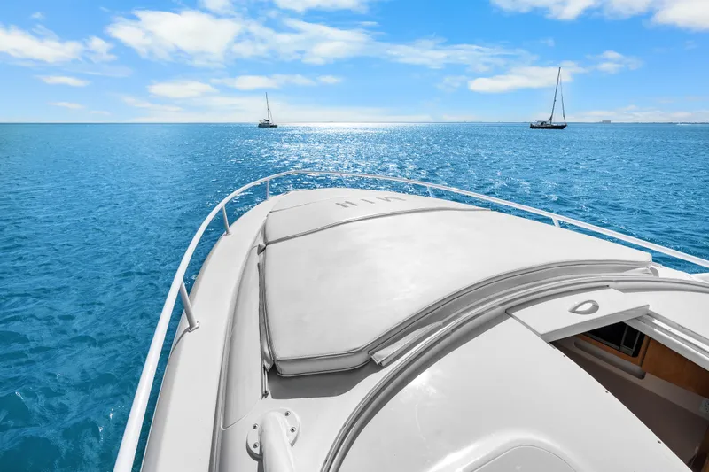 Slide: The Image of 2013 Intrepid 400 Cuddy cruising on clear blue ocean under sunny skies. - 38