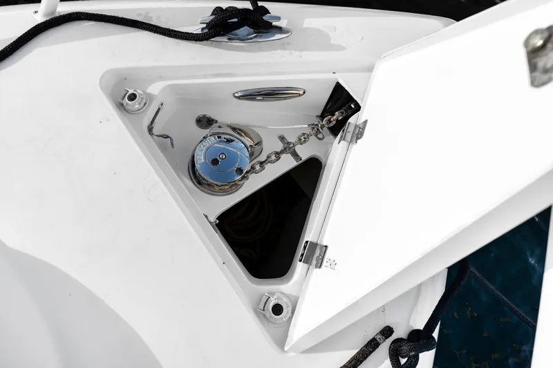 Slide: The Image of Anchor compartment of 2013 Intrepid 400 Cuddy boat with chain and winch. - 39