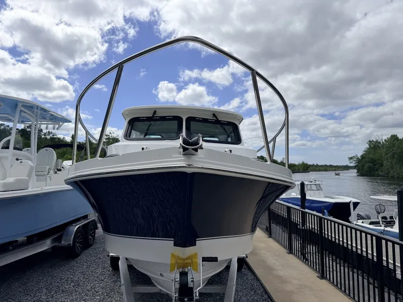 Slide: The Image of Parker Marine 227 Explorer WITH AC AND SEAKEEPER RIDE 2026 - 2