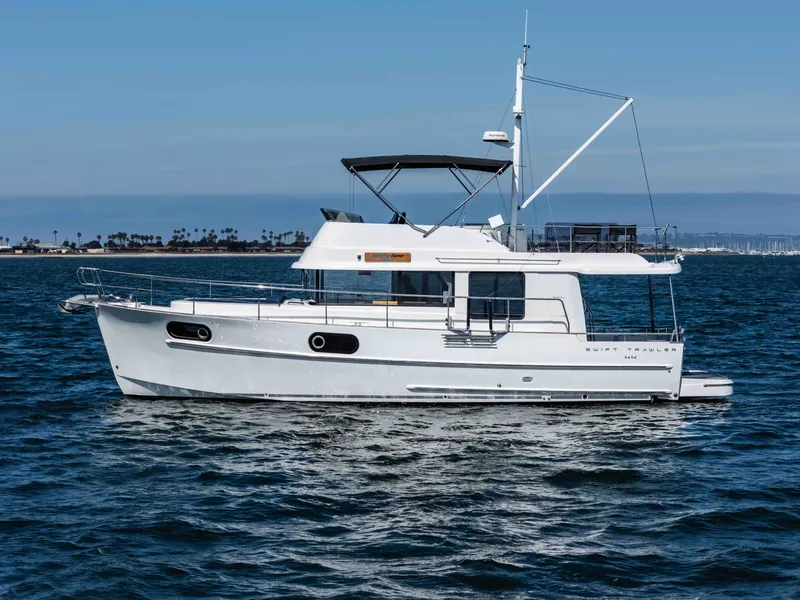 Slide: The Image of 2019 Beneteau Swift Trawler 44 on the water. - 10
