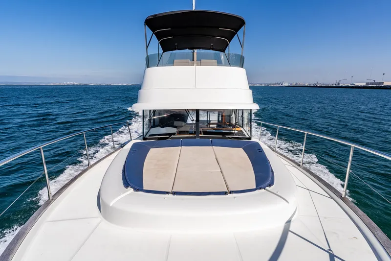 Slide: The Image of 2019 Beneteau Swift Trawler 44 cruising on open sea. - 22