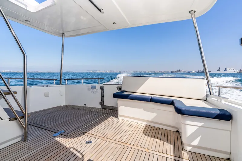 Slide: The Image of 2019 Beneteau Swift Trawler 44 deck view on open sea. - 26