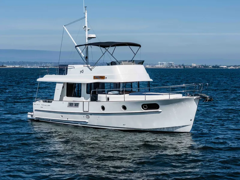 Slide: The Image of 2019 Beneteau Swift Trawler 44 on open water. - 3