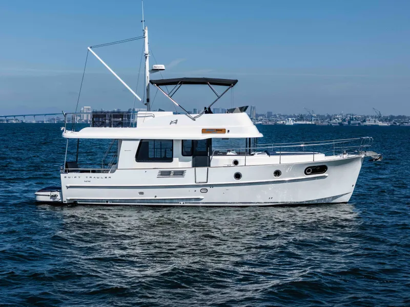 Slide: The Image of 2019 Beneteau Swift Trawler 44 on open water. - 4