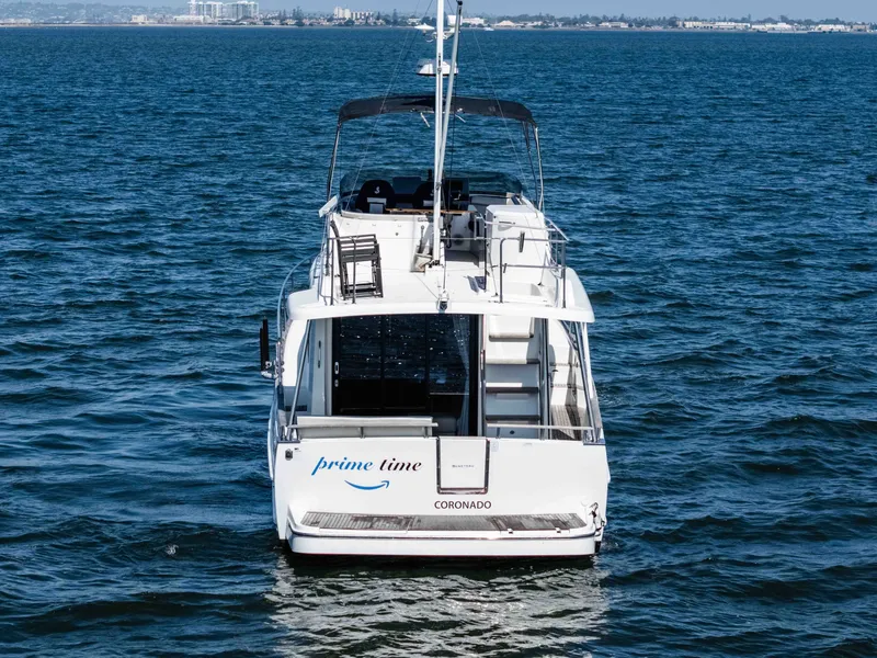 Slide: The Image of 2019 Beneteau Swift Trawler 44 on open water. - 7