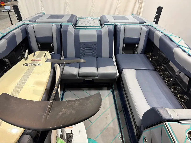Slide: The Image of Interior of 2023 Malibu 26 LSV with surfboard and hydrofoil. - 12