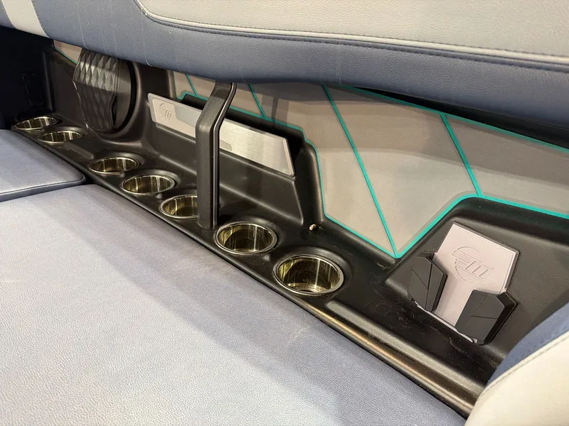 Slide: The Image of Interior of 2023 Malibu 26 LSV with cup holders. - 13