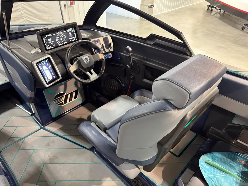 Slide: The Image of Interior of 2023 Malibu 26 LSV featuring modern dashboard. - 14