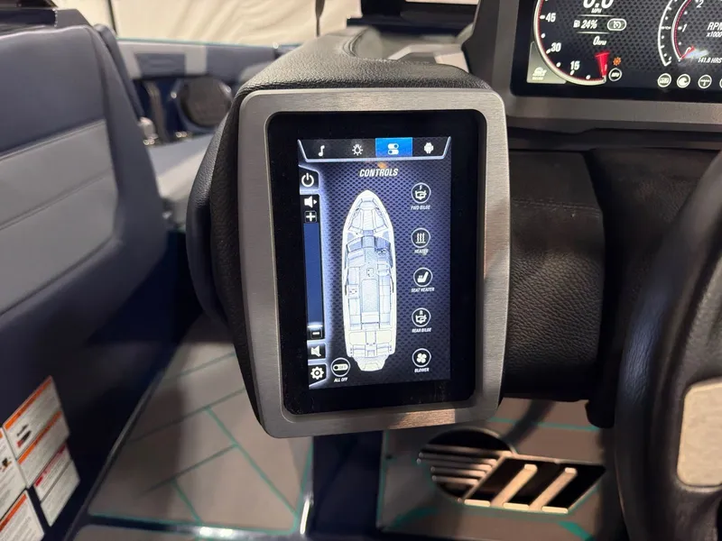 Slide: The Image of Touchscreen control panel in 2023 Malibu 26 LSV boat. - 16