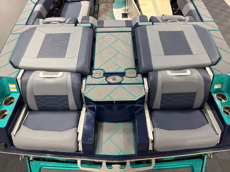 Slide: The Image of Interior of 2023 Malibu 26 LSV with luxurious seating. - 5