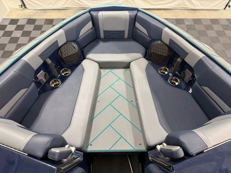 Slide: The Image of Interior of 2023 Malibu 26 LSV with blue and gray upholstery. - 8