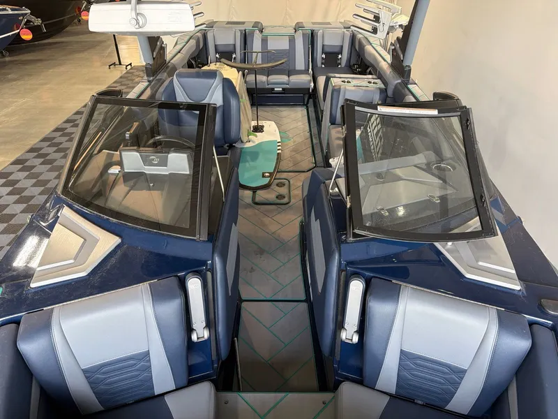 Slide: The Image of Interior view of 2023 Malibu 26 LSV with luxurious seating. - 9