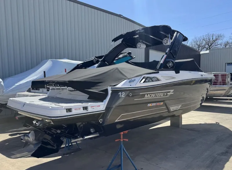 Slide: The Image of 2024 Monterey 278SS Super Sport boat in storage facility. - 2