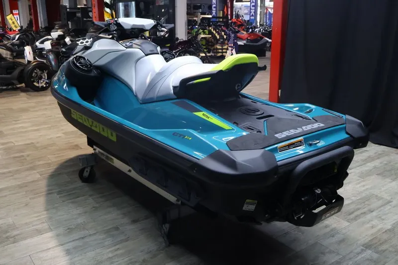 Slide: The Image of 2025 Sea-Doo GTI SE 130 jet ski in showroom - 2