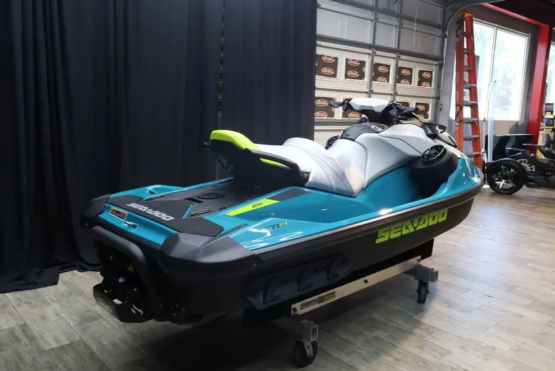 Slide: The Image of 2025 Sea-Doo GTI SE 130 jet ski in a garage. - 4