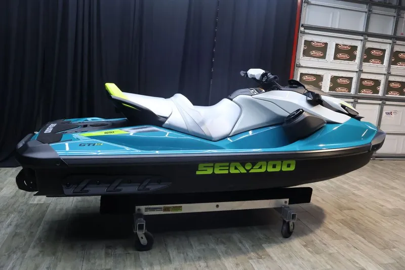 Slide: The Image of 2025 Sea-Doo GTI SE 130 jet ski in a garage. - 5