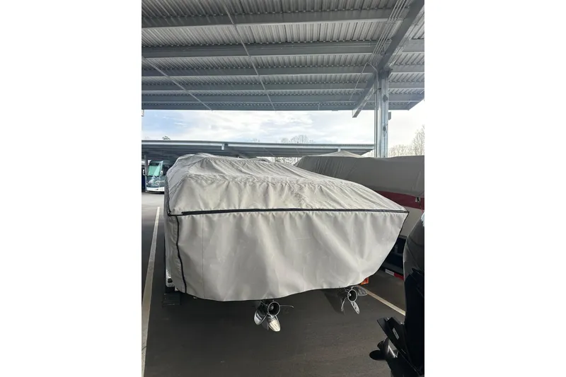 Slide: The Image of Covered 2007 Donzi 35 ZR boat in storage, rear view. - 10