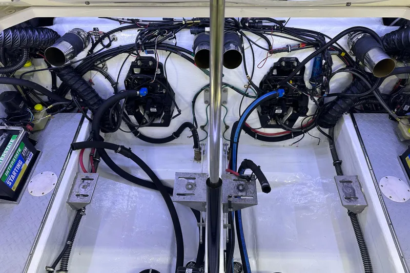 Slide: The Image of Engine compartment of a 2007 Donzi 35 ZR boat, showcasing wiring and components. - 32
