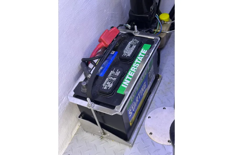 Slide: The Image of Battery compartment of a 2007 Donzi 35 ZR boat with Interstate battery. - 41