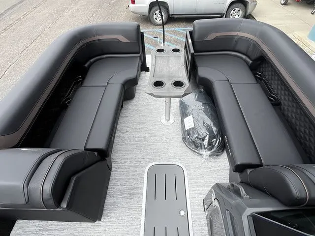 Slide: The Image of Interior of 2026 Bennington 23SSB LUXE with luxurious black seating. - 14